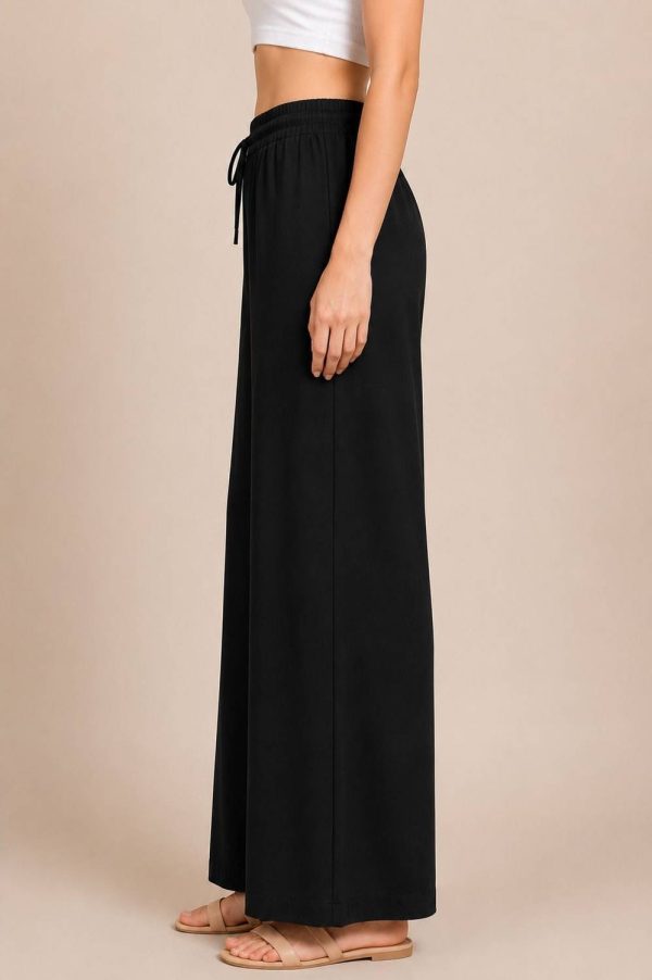 sakpack Flared Women Black Trousers