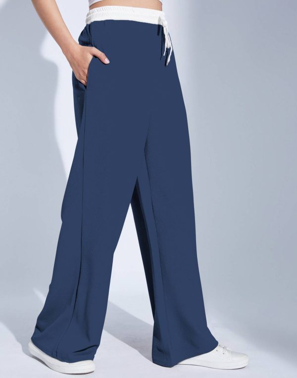 Selvia Flared Women Blue Trousers