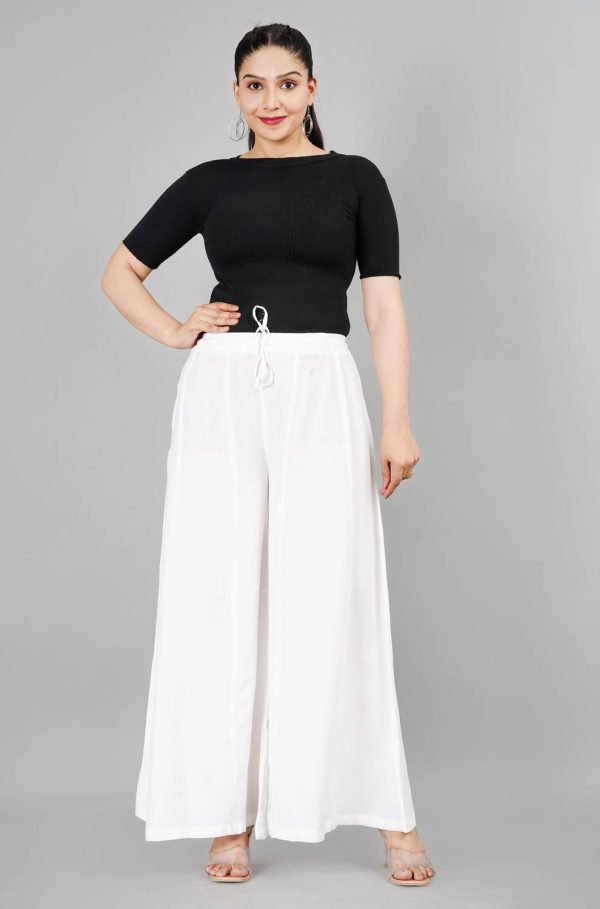 STRICKLIN Flared Women White Trousers